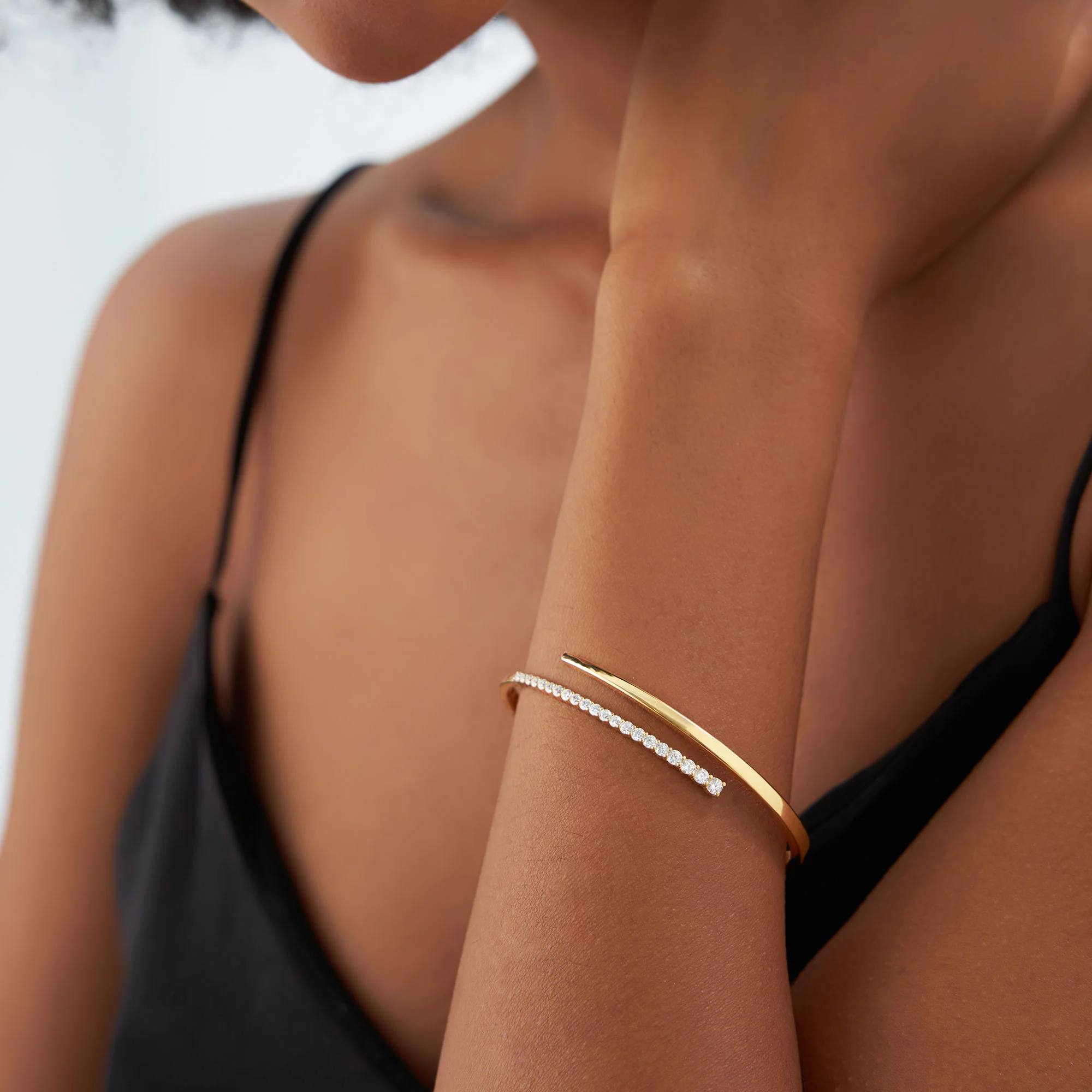 14K Cross Over Graduating Diamond Bangle - Image 2