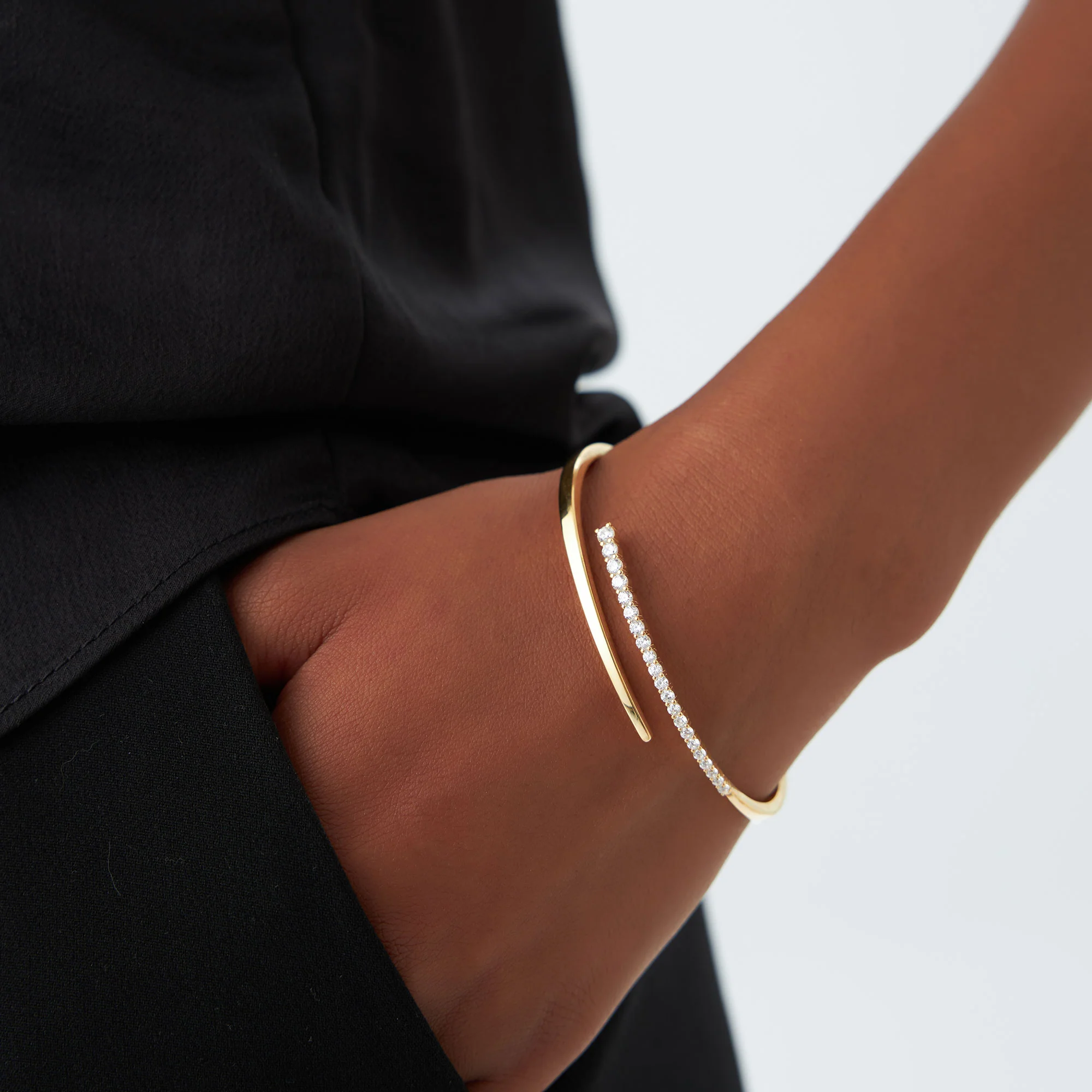 14K Cross Over Graduating Diamond Bangle - Image 4