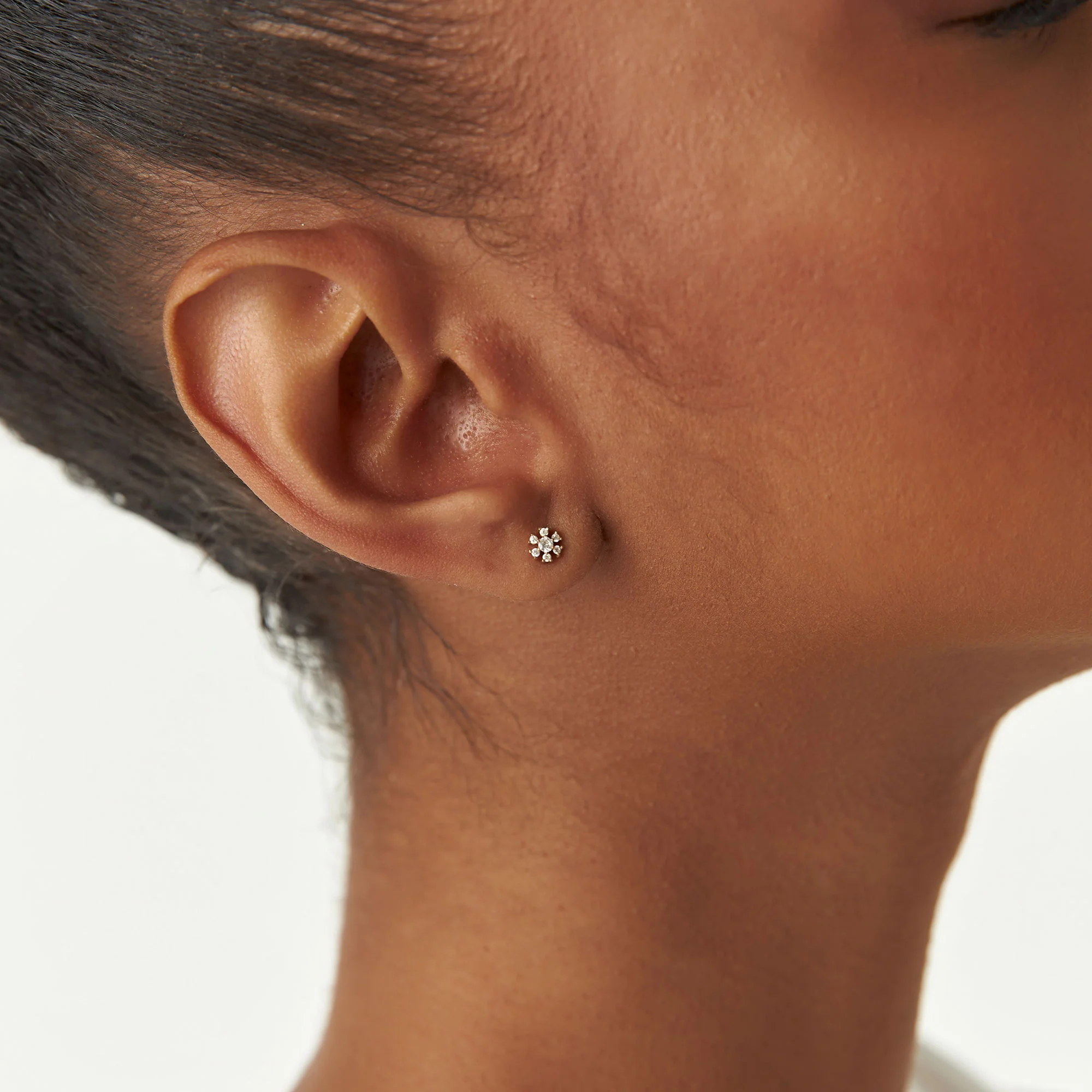 14K Petite Flower Design Diamond Stud Earrings - Image 2