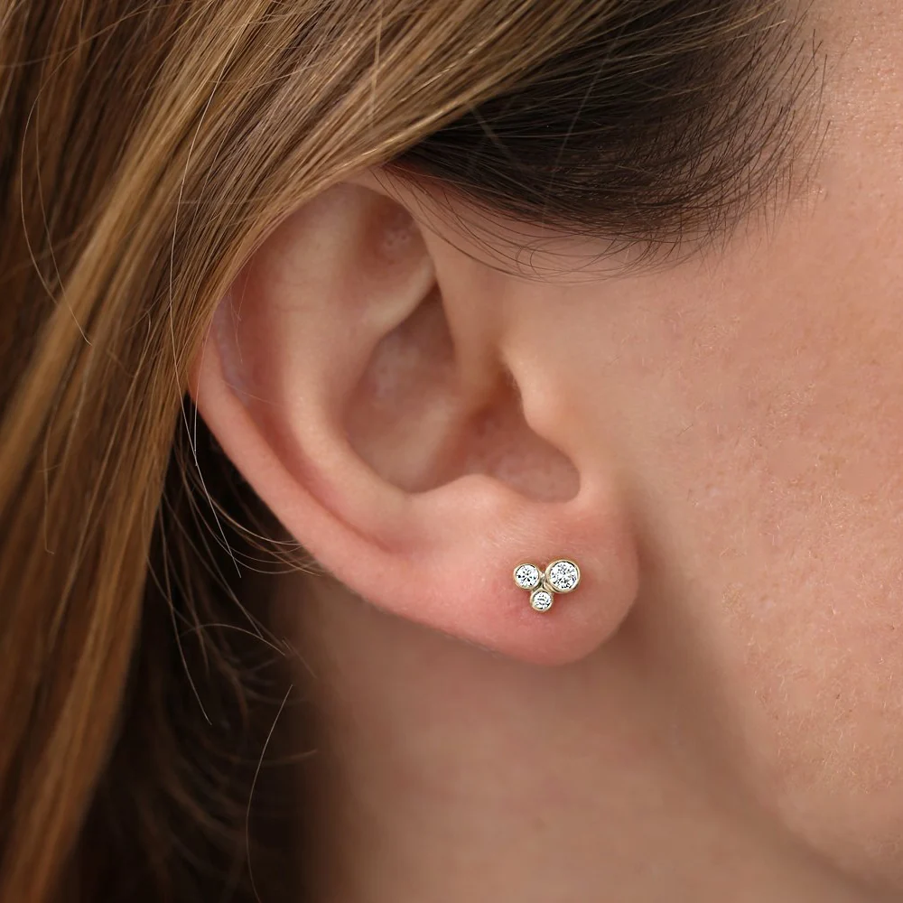 14K Gold Graduated Diamond Stud Earrings - Image 3