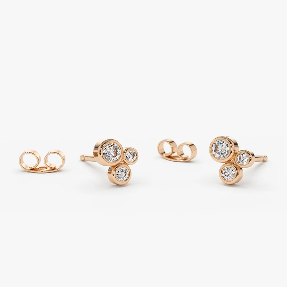 14K Gold Graduated Diamond Stud Earrings - Image 4