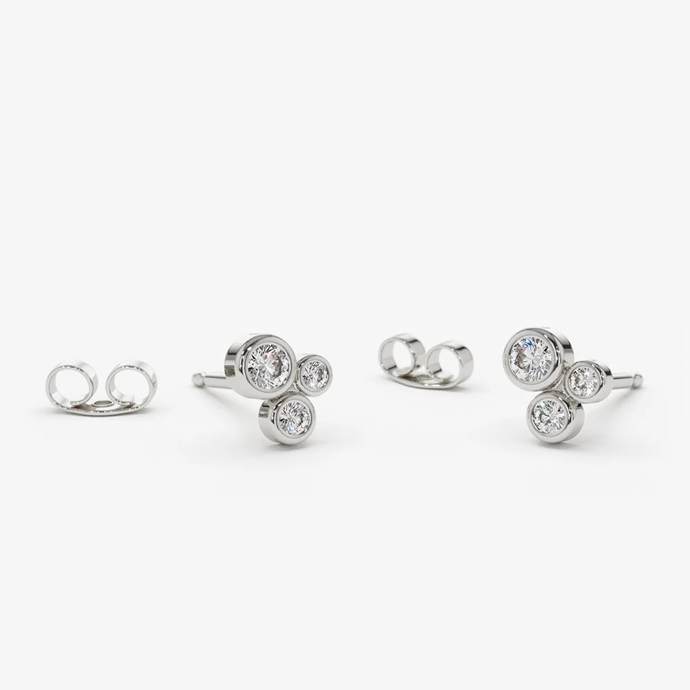 14K Gold Graduated Diamond Stud Earrings - Image 5